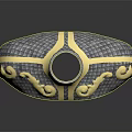 Ornate Metallic Decorative Object With Golden Scroll Patterns And Checkerboard Texture