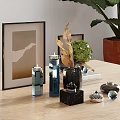 Decorative Ornament Combination With Photo Frames Glass Candle Holders Marble Decor And Green Plant On Wooden Table
