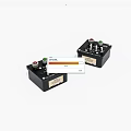 Two Black Electronic Control Modules With Knobs Buttons And Colored Indicator Lights 3d model