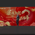 Group Photo Check In Spot with Red Background Golden Dragon K·BIRD Logo New Journey Theme