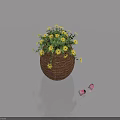Beautiful Potted Plant With Yellow Flowers And Green Leaves In Woven Basket With Pink Petals On Smooth Surface