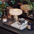 Stylish Decorative Ornament Collection Featuring Table Lamp Vintage Camera Books And Metallic Containers