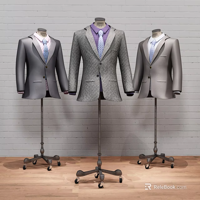 Three Classic Formal Suits On Mannequins With Brick Wall And Wooden Floor 3d model 