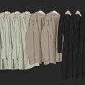 Stylish White Beige Gray Long Coats Hanging Neatly on Hangers