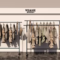 Clothes Rack Displaying Multiple Casual Knitwear And Striped Sweaters In Retail Store