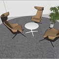Modern Lounge Area With Brown Black Chairs White Round Table Green Plant And Gray Carpet