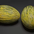 Two Fresh Ripe Cantaloupe Fruits With Green Yellow Striped Skin