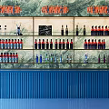 Modern Bar Interior Design With Blue Counter And Shelves Of Colorful Bottles