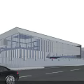 Modern Industrial Factory Building With Glass Curtain Walls Metal Panels Entrance Area And Roadside Greenery