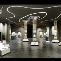 Indoor Exhibition Hall Featuring Carved Columns Gray Floor Curved White Lighting and Display Exhibits