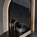 Modern Bathroom Washbasin with Arched LED Lit Mirror Black Countertop and Concrete Wall