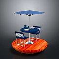 Outdoor Patio Setup With Round Table Blue Umbrella Chairs And Wooden Platform