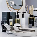 Elegant Bathroom Accessories with Soft Towels Aromatic Candles Decorative Mirrors Lotion Bottles and Decorative Branches