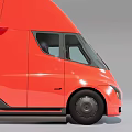 Red Tesla Semi Electric Truck With Streamlined Front Design And Modern Look