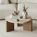 Modern Living Room Coffee Table With Round Marble Top Oak Legs Books And Dried Flowers