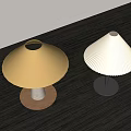 Yellow Shade And White Pleated Table Lamps With Wooden And Black Bases On Dark Tabletop