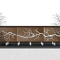 Wooden Feature Wall With Intricate White Branch Design Flanking Bare Trees And Small Decorative Ornaments