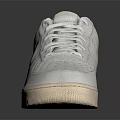 Nike White Classic Low Top Sneakers With Lace Up Closure And Beige Sole Design