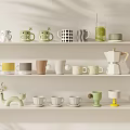 Various Decorative Ceramic Mugs And Coffee Maker On White Shelf 3d model
