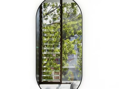 Large Oval Mirror Reflecting Green Trees And Buildings In Interior Space 3d model