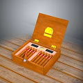 Open Wooden Cigar Box With Gold Emblem Containing Cigars On Wooden Surface