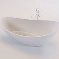 Modern White Freestanding Bathtub with Curved Design and Chrome Faucet in Sleek Style