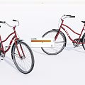 Two Red Classic Bicycles With Vintage Frames And Black Seats