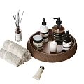 Daily Washing Essentials With Wicker Tray Skincare Bottles Towels Candle And Fragrance Sticks