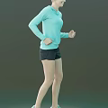 A Woman Wearing Light Blue Hooded Long Sleeve Top and Black Shorts Jogging