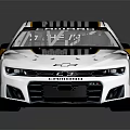 Chevrolet Race Car With Black Yellow Stripes And Streamlined Body Design