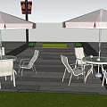 Outdoor White Table Chair Set With Red White Umbrella And Red Telephone Booth