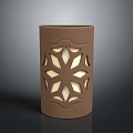 Brown Cylindrical Decorative Candle Holder Featuring Intricate Star Cutout Patterns