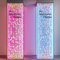 Illuminated Decorative Columns With Hi Welcome Happy Text And Pink Blue Lighting Patterns