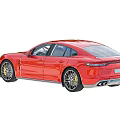 Red Luxury Sports Car With Sleek Aerodynamic Design And Alloy Wheels