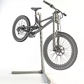 Red Mountain Bicycle on Repair Stand with DURO Tires and Suspension System