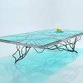 Glass Coffee Table With Black Metal Wire Legs And Yellow Fruits On Top