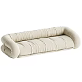 Comfortable Beige Upholstered Sectional Sofa With Stitched Details And Modern Design