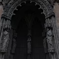 Garden Landscape With Gothic Architectural Entrance And Carved Stone Statues