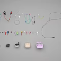 Various Types of Headphones and Speakers with Accessories in Multiple Colors Neatly Arranged 3d model
