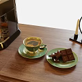 Elegant Coffee Cup On Wooden Table With Green Plates Chocolate Coffee Machine And Candles