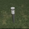 Modern Outdoor Bollard Light with Silver Top and Illuminated Section on Green Grass