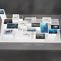 Modern Exhibition Display Stand With Multiple Panels Images Text On White Platform 3d model