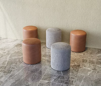 Five Round Brown and Gray Stools on Marble Floor Against Light Wall 3d model