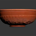 Intricate Hand Sculpted Orange Clay Bowl With Artisanal Textured Surface Design