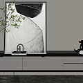 Modern TV Stand with Decorative Artwork Vase and Figurine in Minimalist Interior