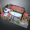 Old Industrial Factory Buildings With Red Gray Roofs Chimney And Green Plants