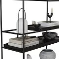 Modern Black Metal Multi Tiered Shelf With Decorative Vases Books And Candle Holder