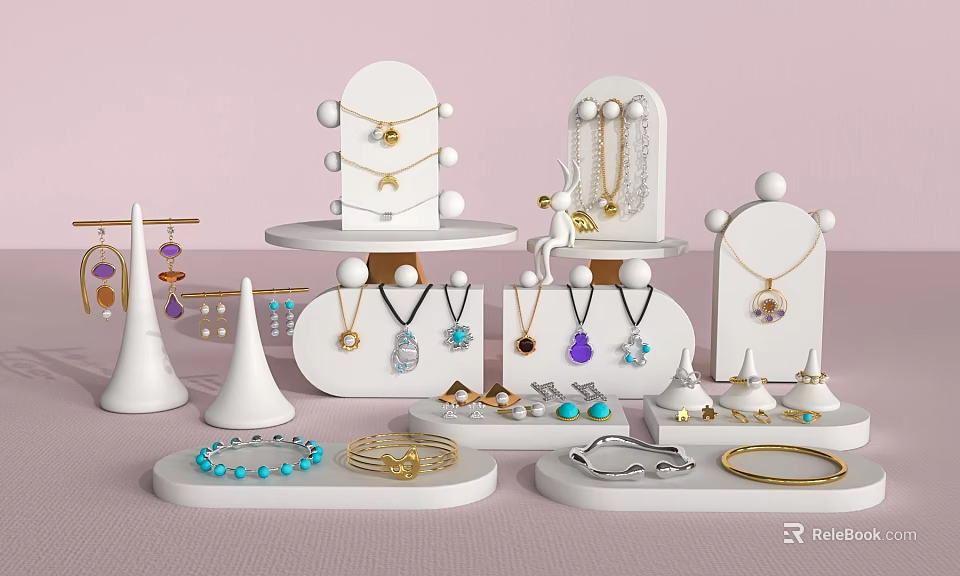 Elegant Jewelry Display On White Stands With Various Necklaces Bracelets And Gemstone Rings 3d model 