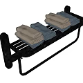Black Wall Mounted Towel Rack With White And Blue Folded Towels