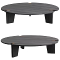 Round Dark Wood Coffee Table With Sturdy Angular Legs And Brass Accents